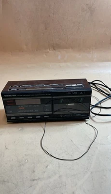 Soundesign Model 3838WAL AM FM Radio Cassette Alarm Clock Wood Grain - Image 1 of 4