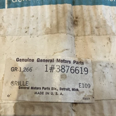 Corvair rear air outlet grill NOS 1966-1969 3876619 - Image 1 of 4