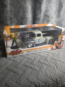 1956 FORD F-100 STREET FIGHTER GUILE FIGURINE 1/24 DIECAST MODEL CAR JADA 34373 - Picture 1 of 10