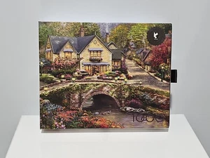Thomas Kinkade Studio Summer In Cobblestone Village Puzzle  - Picture 1 of 2