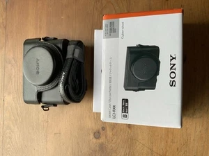 Sony LCJ-RXK Faux Leather Jacket Case & Strap for RX100 Series Digital Cameras - Picture 1 of 5