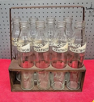 8 BOTELLAS DE VIDRIO PUBLICITARIAS LINCO MARATHON MOTOR OIL CO CON ESTUCHE DE TRANSPORTE DE METAL  Foto 1 de 4