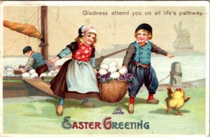 EASTER GREETINGS - CHILDREN UNLOAD EGGS FROM BOAT - 1912 EMBOSSED POSTCARD - Picture 1 of 2