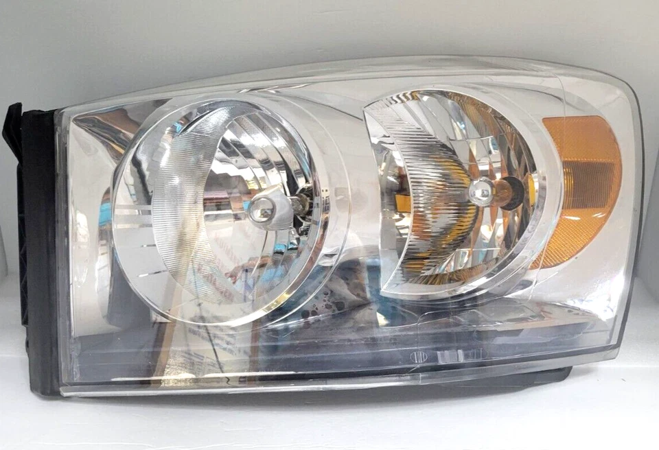Faro lado conductor izquierdo Dodge Ram 1500 2500 con bombillas Eagle Eye ARBD10102 Foto 1 de 4