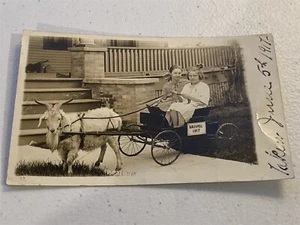 1917 rppc Kalispell, MT, two girls in Goat drawn cart, w/ explanation - Picture 1 of 2