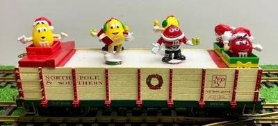 Coche de Navidad favorito calibre G #12 -- Góndola con 7 figuras M&M -- Bachmann Foto 1 de 2