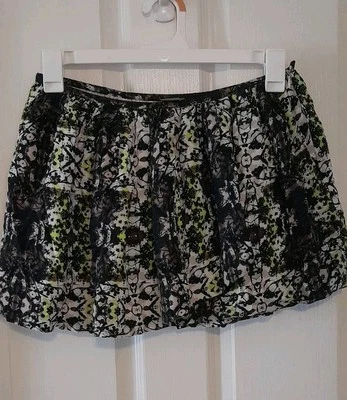 Vintage White With Black Purple  Yellow Spatter Color Mini Skirt.  Waist 30".b62 - Image 1 of 4