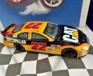 Racing Champions 2000 NASCAR 1/24 #22 Ward Burton CAT Dodge Charger R/T YELLOW - Picture 1 of 2
