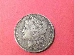 1900-O Morgan Head Silver Dollar (brown) - Picture 1 of 2