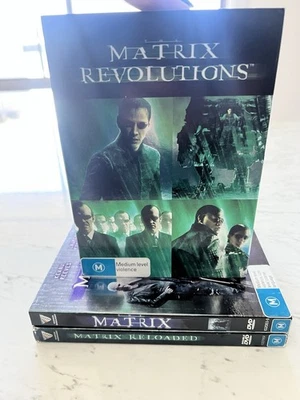 The Matrix Trilogy DVD Movies Set 1, 2 & 3 - Keanu Reeves PAL Reg 4  - image 1 of 4
