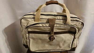 Bolsa de viaje de lona y cuero 20x12x6. Falta correa para el hombro Foto 1 de 4