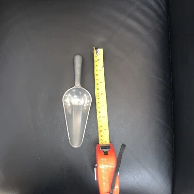 Cuchara de caramelo vintage con fondo redondo  Foto 1 de 2