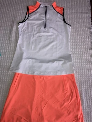 Conjunto feminino de golfe ou tênis S/P Annika laranja neon - Imagem 1 de 4