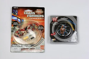 Tavola di marca Transformers Hasbro e WWF Steve Austin YOYO - Nuova sigillata - Foto 1 di 2