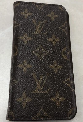 Funda tipo folio para teléfono Louis Vuitton con monograma iPhone 7 y 8 Plus LEER Foto 1 de 4