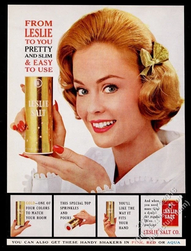 1961 Leslie salt smiling woman with gold foil shaker container photo print ad - Image 1 of 1