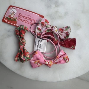 🍓NWT Strawberry Shortcake doll hair ties with bows set of 4 adorable pink tie - Picture 1 of 6