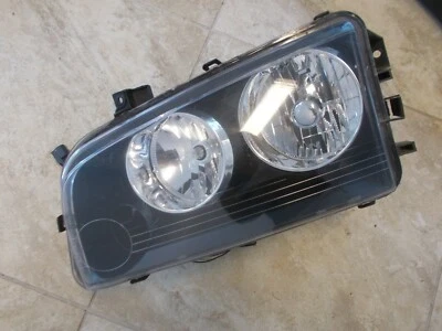 Faro izquierdo para conductores Dodge Charger 07 08 09 buen estado usado Foto 1 de 3