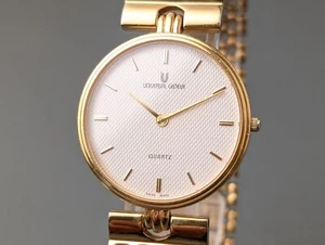Orologio uomo vintage anni 70-80 UNIVERSAL GENEVE oro quarzo zaffiro 31mm - Foto 1 di 17