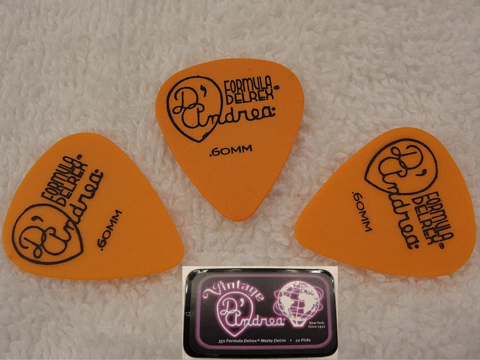 Selecciones de guitarra D'ANDREA 351 TNDX60 Delrex Delrin .60MM NARANJA 12 púas en lata Foto 1 de 2