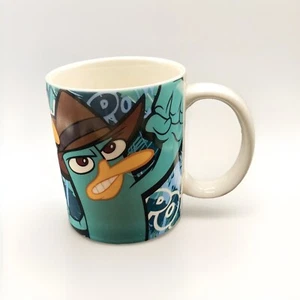 Taza de cerámica DISNEY PHINEAS & FERB AGENT P de JERRY LEIGH nueva - Imagen 1 de 8