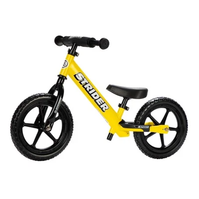 Bicicleta de equilibrio Strider 12” deportiva amarilla niños 1-4 años almohadilla de seguridad neumáticos Foto 1 de 4