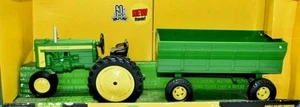 Ertl 121734 1:16 Scale Jhon Deere Die Cast Unistyled Model A Tractor w/Wagon - Picture 1 of 1