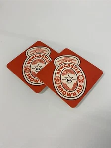 2 X Newcastle Brown Ale Dolphinarium Cartoon Beer Mat Coaster - Picture 1 of 3
