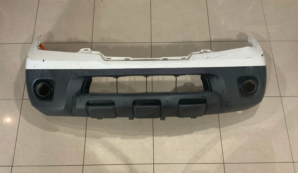 Cubierta de parachoques superior delantera blanca Nissan Frontier 62022+ZL00B 2009-2021 OEM Foto 1 de 4