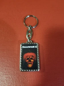 HALLOWEEN 2 - FILMPOSTER DOPPELSEITIG METALL SCHLÜSSELANHÄNGER - Bild 1 von 2