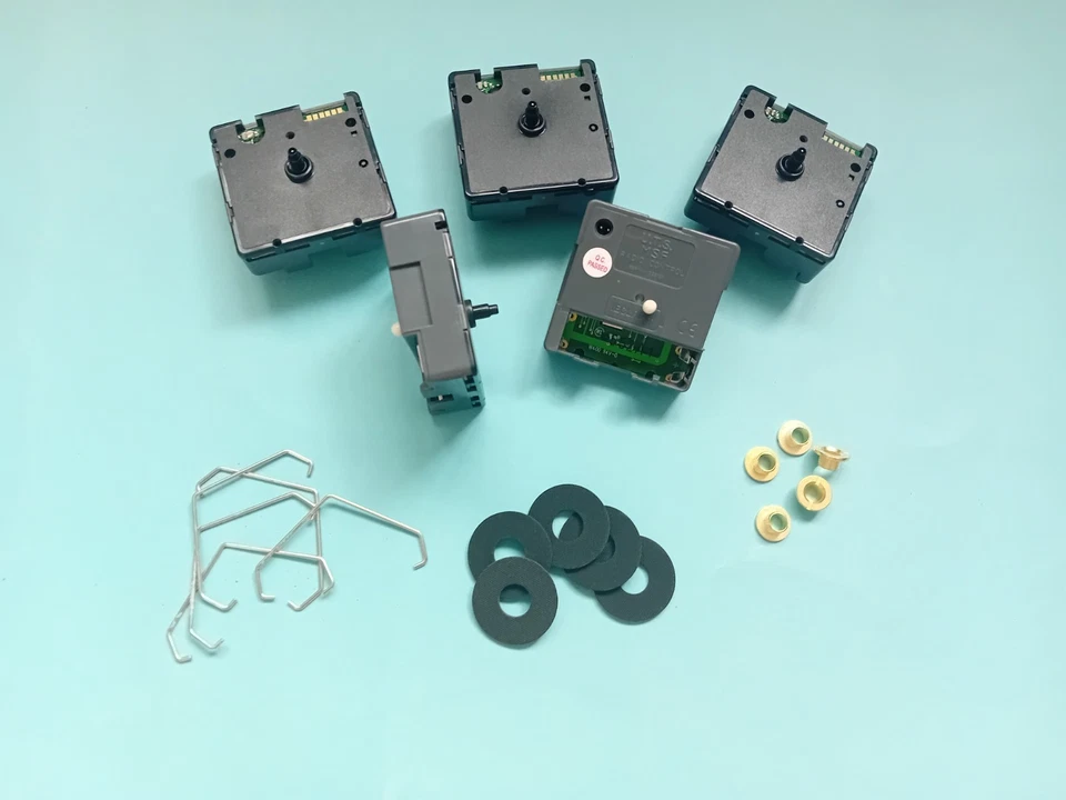 5 x UTS Radio Controlled Quartz Clock Movements MSF signal 11mm round shaft - Image 1 of 1