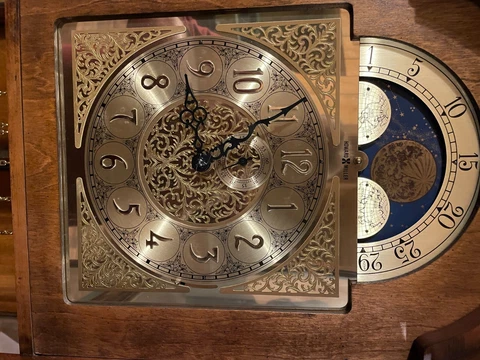grandfather clock howard miller Cover