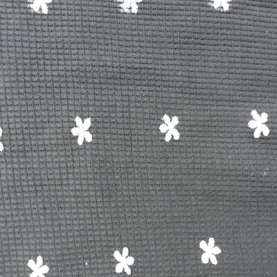 Flocked Basket Weave Knit Fabric Black w/White/Blue Flowers W: 60" L 1 Yard 29" - Image 1 of 3