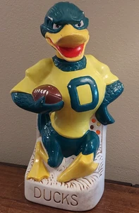 Decanter vintage OREGON DUCKS anni 70 NCAA calcio mascotte Ceramarte VUOTO MOLTO RARO!! - Foto 1 di 12