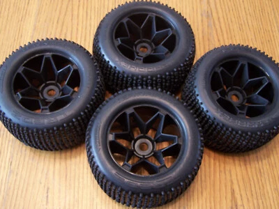 (4) HPI Savage X 4.6 GT-6 Tires & Havok Black 17mm Wheels XL Flux 5.9 Rim Foam - Image 1 of 3