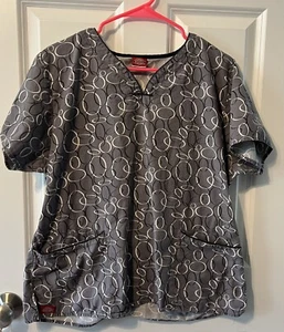 DICKIES WOMENS SIZE LARGE SCRUB. ELASTIC BACK. CIRCULAR PATTERN. - Picture 1 of 4