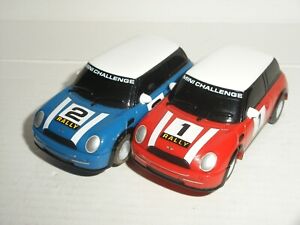12V MICRO Scalextric - Pair of BMW Mini (Blue / Red) - Nr. Mint