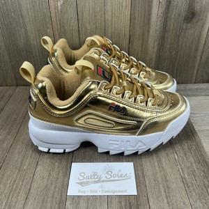 fila disruptor branco e dourado
