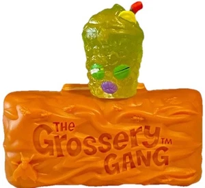 The Grossery Gang Series 1 Grimey Lime Green Figure W/Chocolate Bar Case Tan - Picture 1 of 8