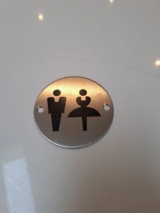 Toilet Door Symbol Sign 75mm Dia in Satin Stainless Steel - Picture 1 of 2