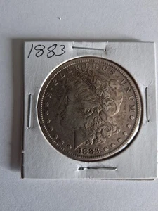 1883 Morgan Silver Dollar - Picture 1 of 2