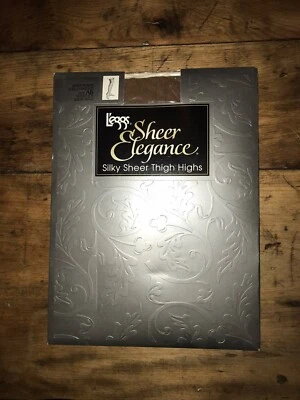 DE COLECCIÓN L'EGGS PURA ELEGANCIA SEDOSA TRANSPARENTE HASTA EL MUSLO TALLA AB SATINADO BEIGE TRANSPARENTE A Foto 1 de 4