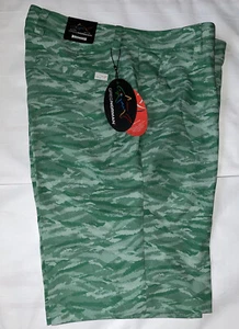Pantalones cortos de golf Greg Norman ML75 Microlux Performance para hombre talla 32 verde juguetón camuflado - Imagen 1 de 11