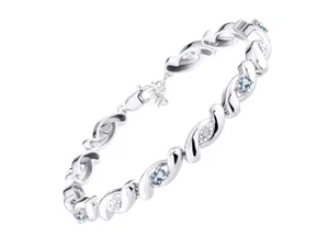 PULSERA TENIS RYLOS AGUAMARINA Y DIAMANTES PLATA DE LEY 7-8" - Imagen 1 de 6