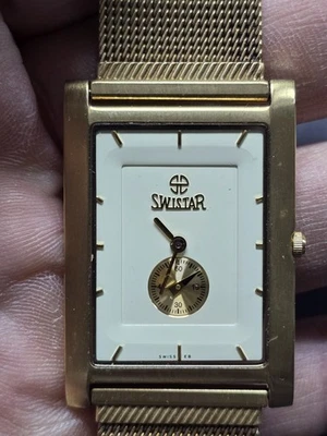 Swistar Damas Precisión Cuarzo Esfera Dorada y Correa de Reloj de Dos Tonos con Fecha-No Probada Foto 1 de 4