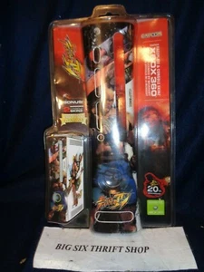 Placa frontal XBOX 360 Street Fighter IV y 2 consolas Skinz Capcom Mad Catz - Imagen 1 de 2