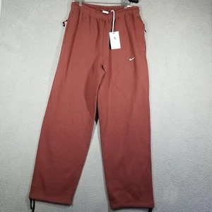 Nike Solo Swoosh Men's M Open-Hem Fleece Pants FN3342-Cinnabar Color Sample Rare - Picture 1 of 12