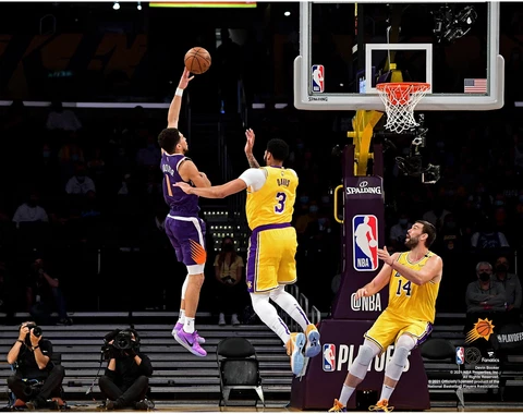 Devin Booker Phoenix Suns Unsigned 2021 NBA Playoffs Round 1 Layup Photograph Cover