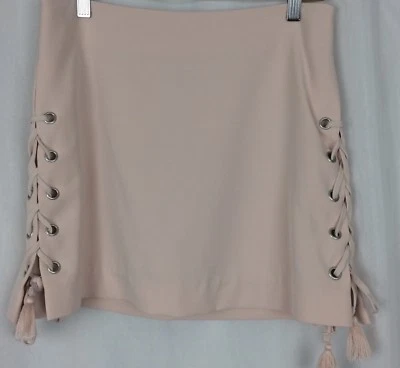 Falda corta Rebecca Minkoff rosa con cordones borlas laterales talla 6 cremallera trasera expuesta  Foto 1 de 4