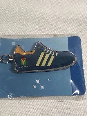 NEW GUYANA Mini Soccer Shoe Keychain Sneaker Trainer Blue & Gold - Image 1 of 4